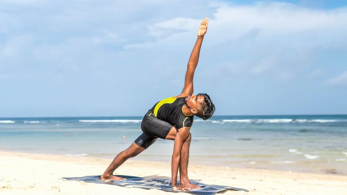 What is Trikonasana, Benefits by Yoga Vidya Mandiram - Issuu